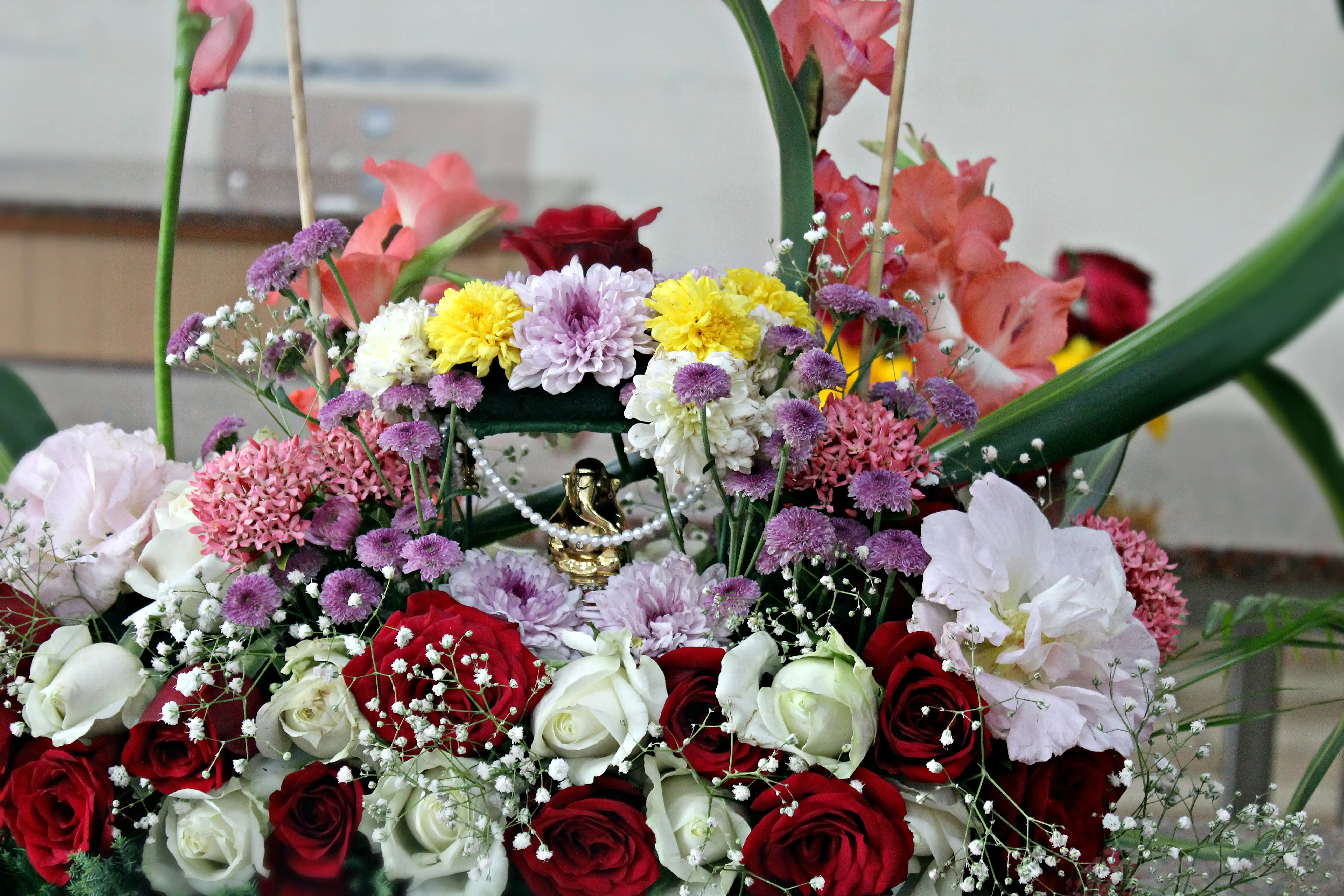 Colourful flowers arranged creatively by students