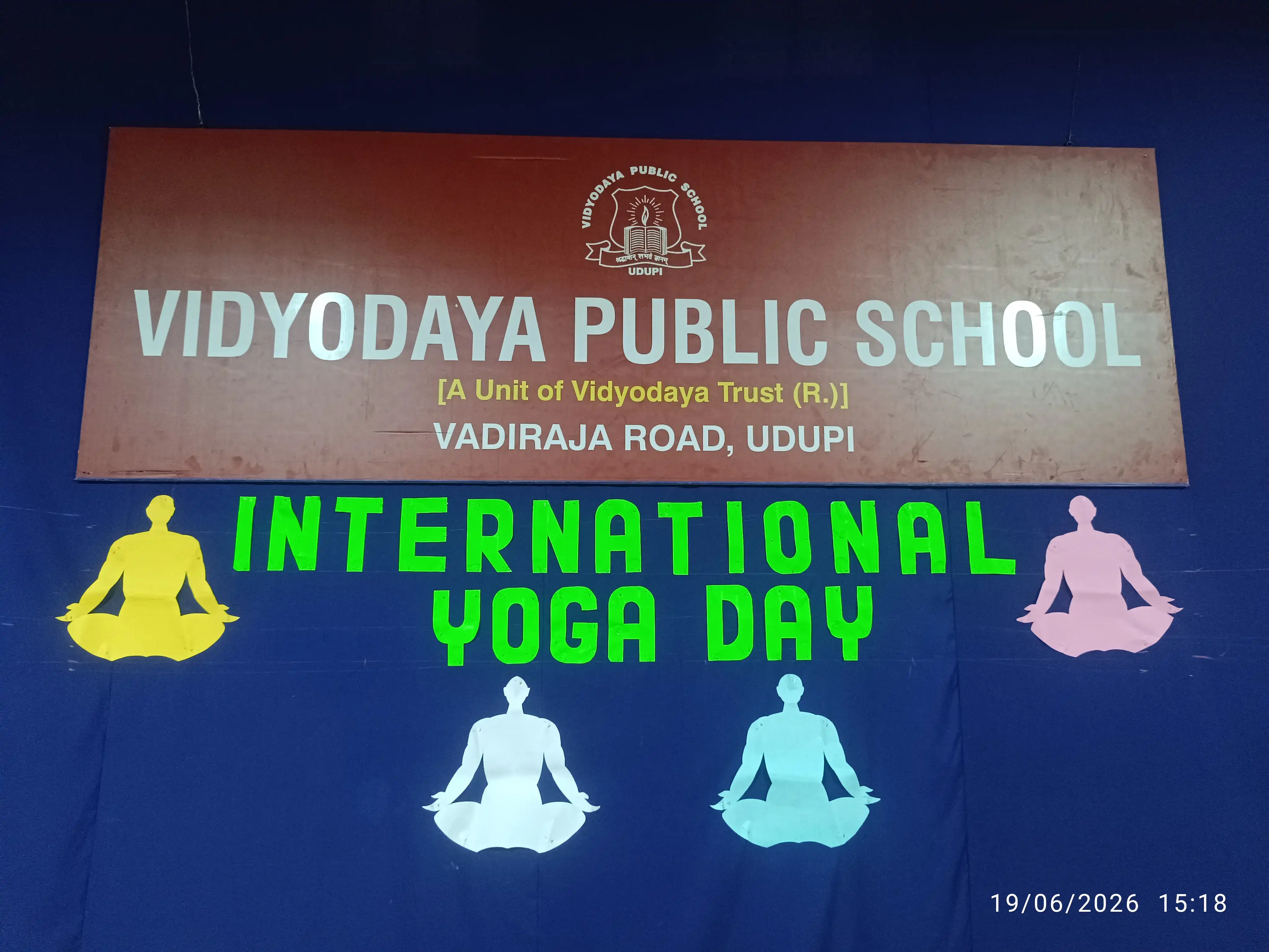 Children practicing yoga postures at Vidyodaya Public School