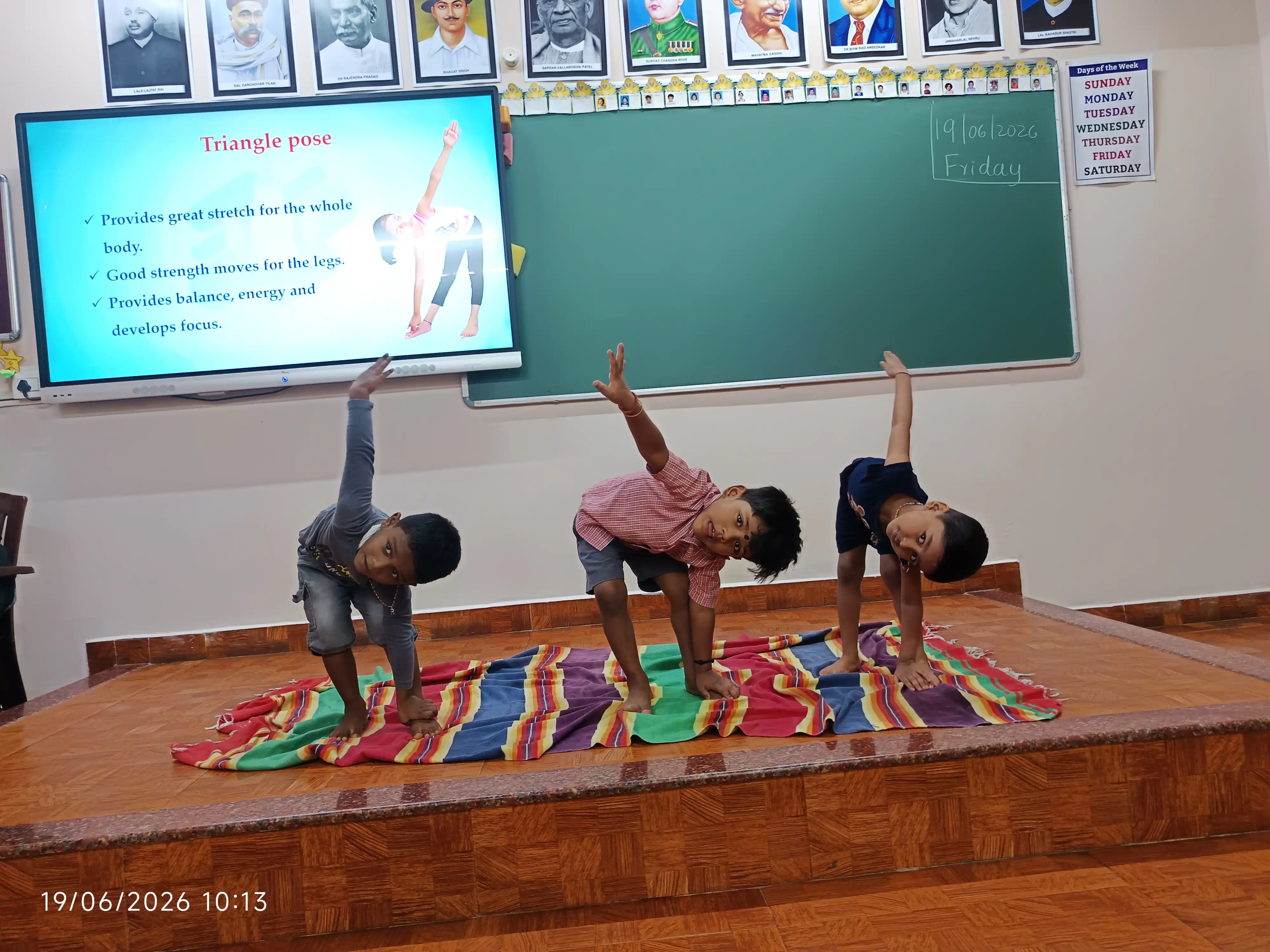 Children practicing yoga postures at Vidyodaya Public School