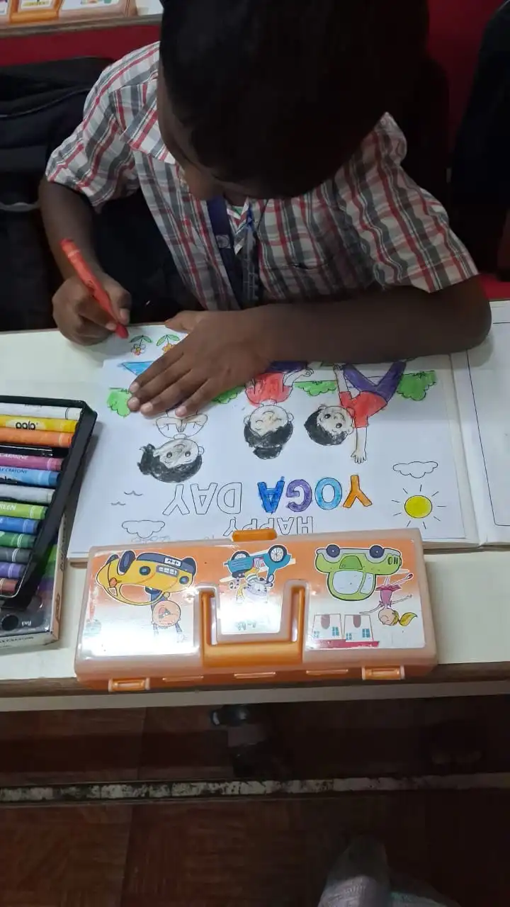 Children practicing yoga postures at Vidyodaya Public School