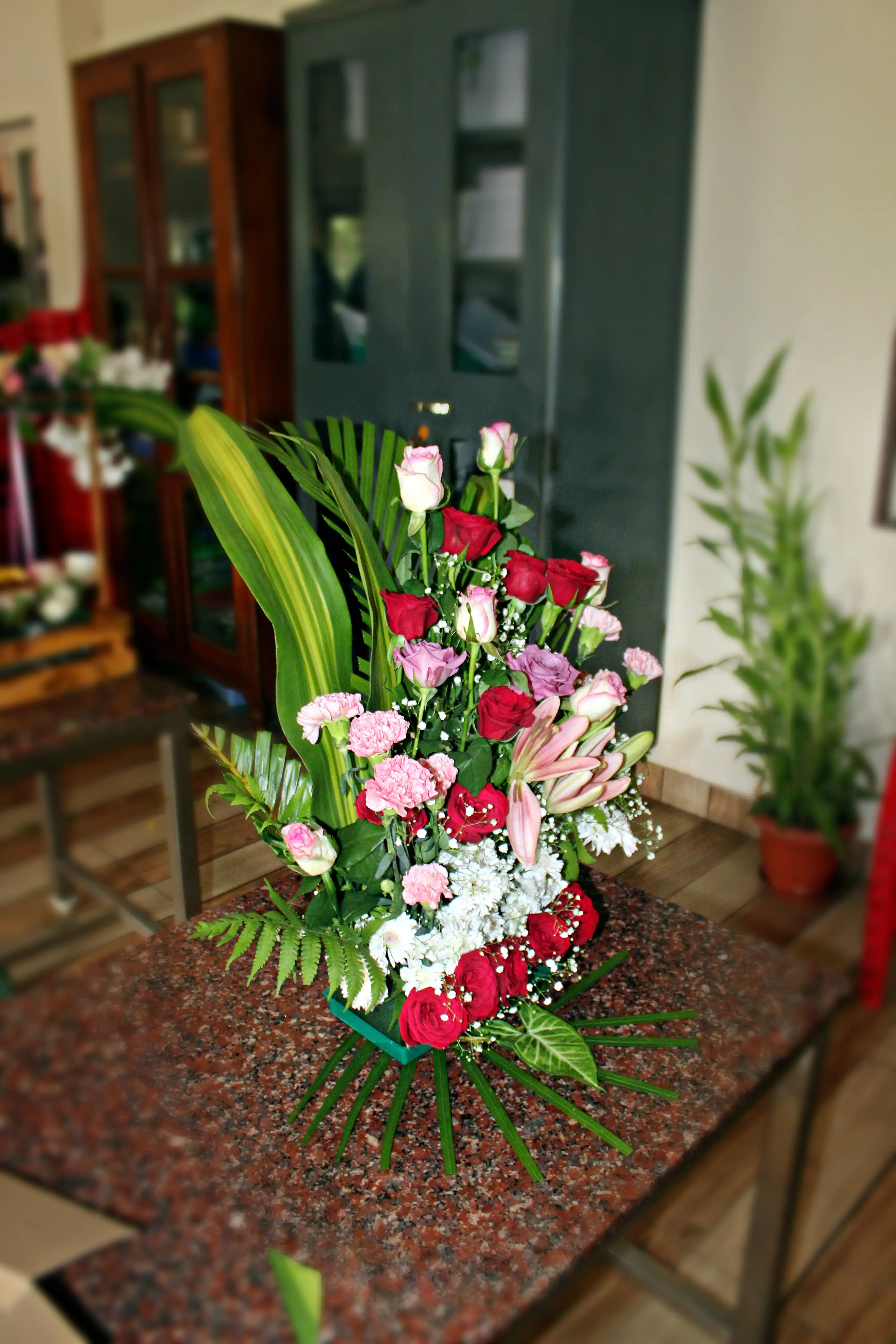 Colourful flowers arranged creatively by students