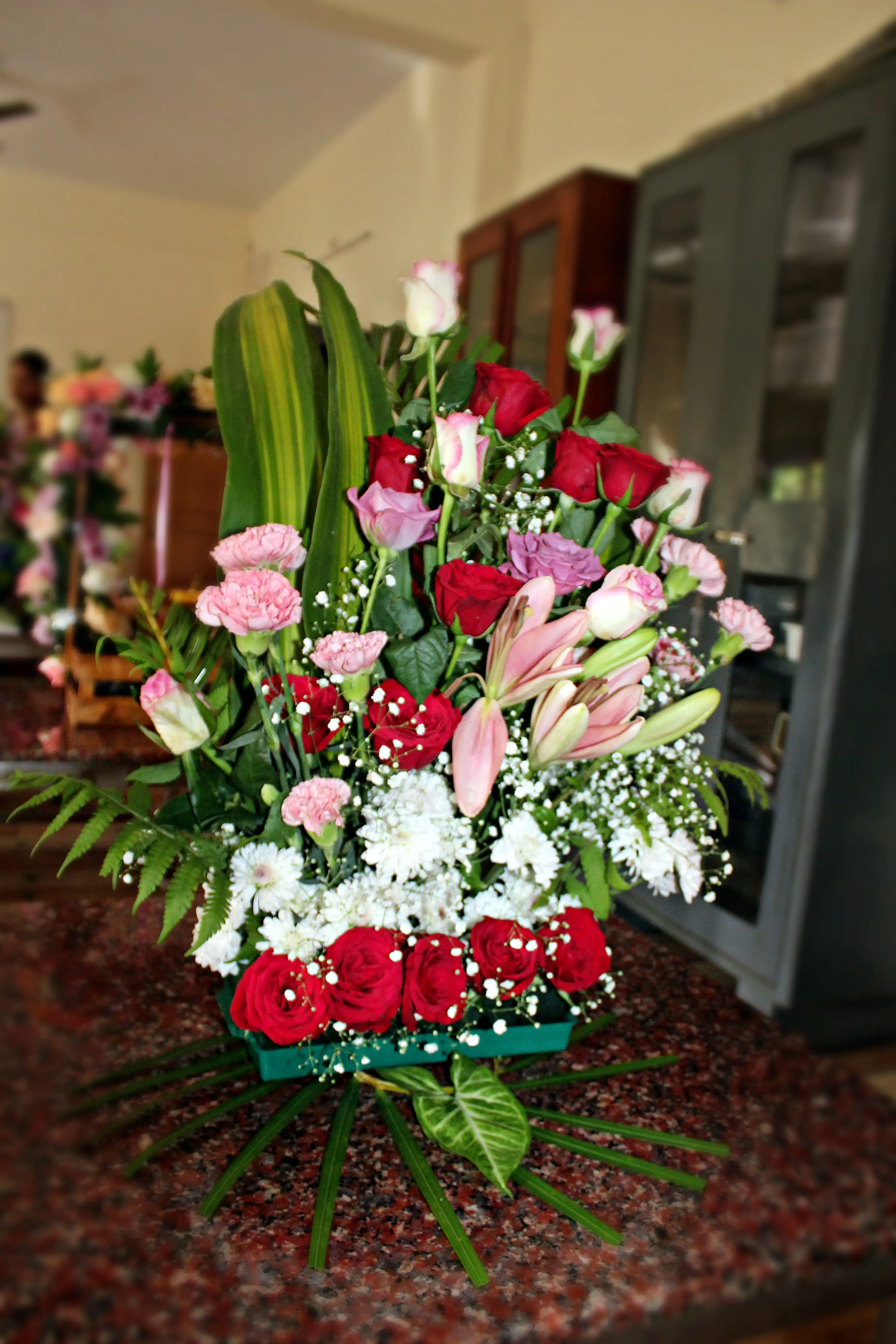 Colourful flowers arranged creatively by students