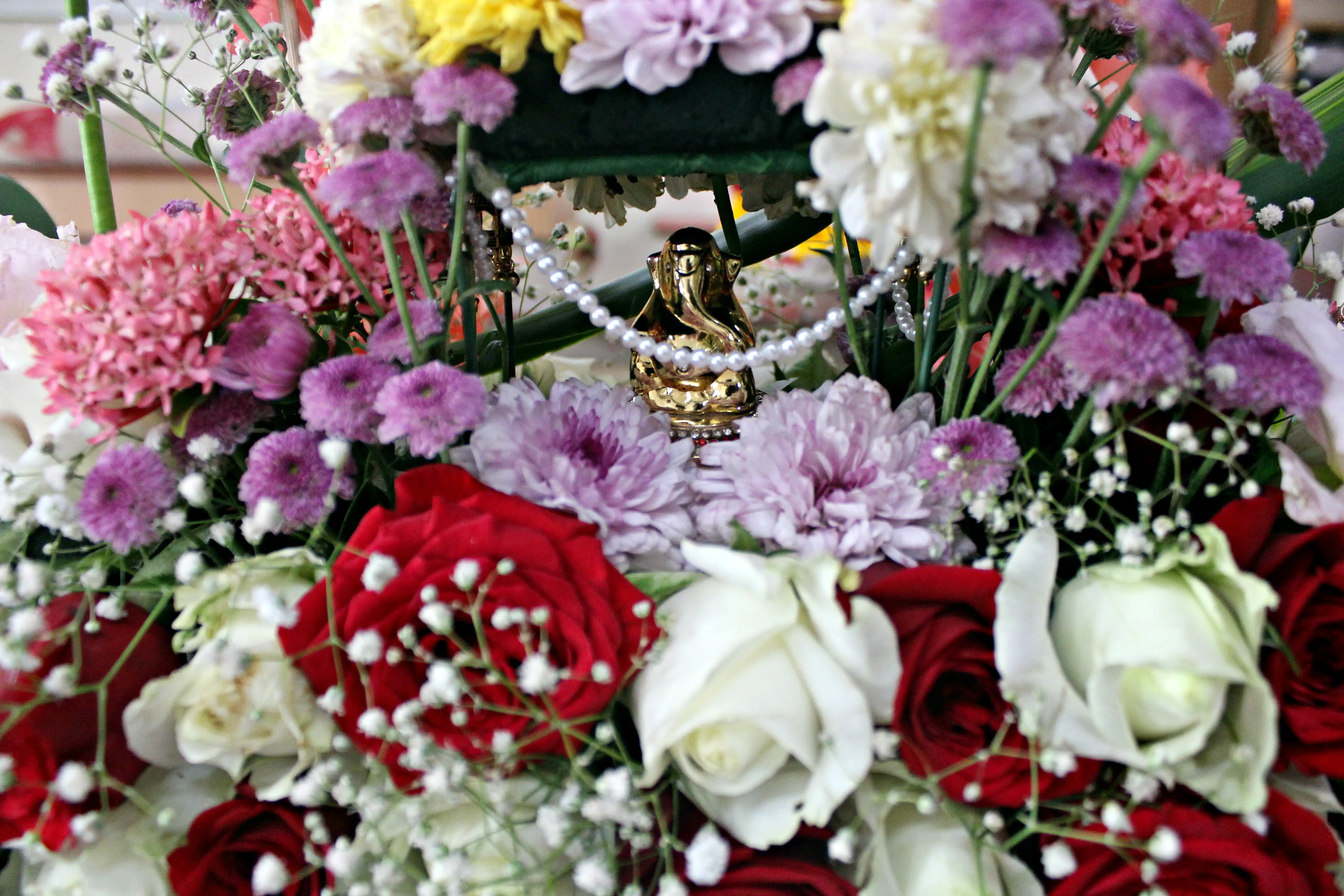 Colourful flowers arranged creatively by students