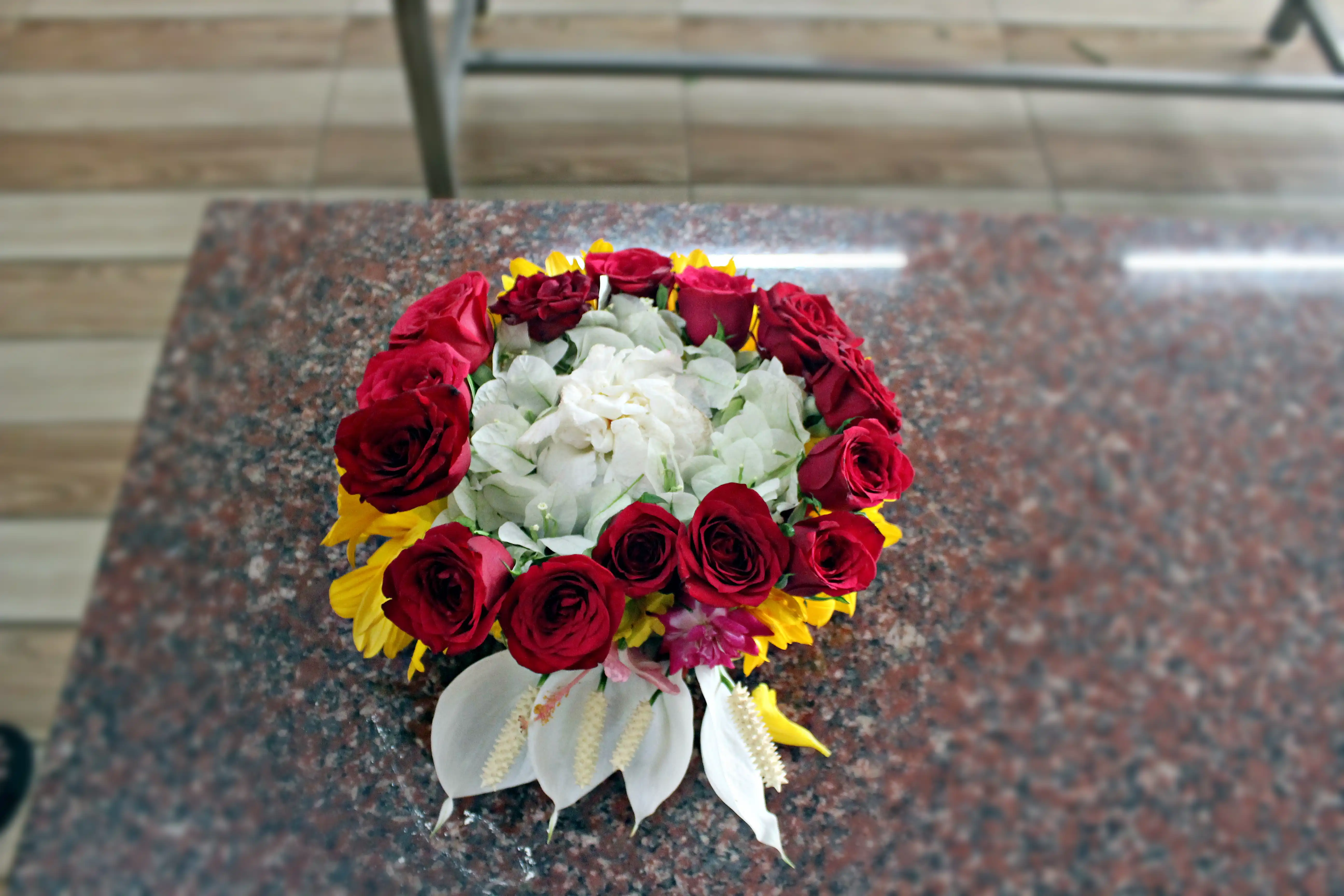 Colourful flowers arranged creatively by students