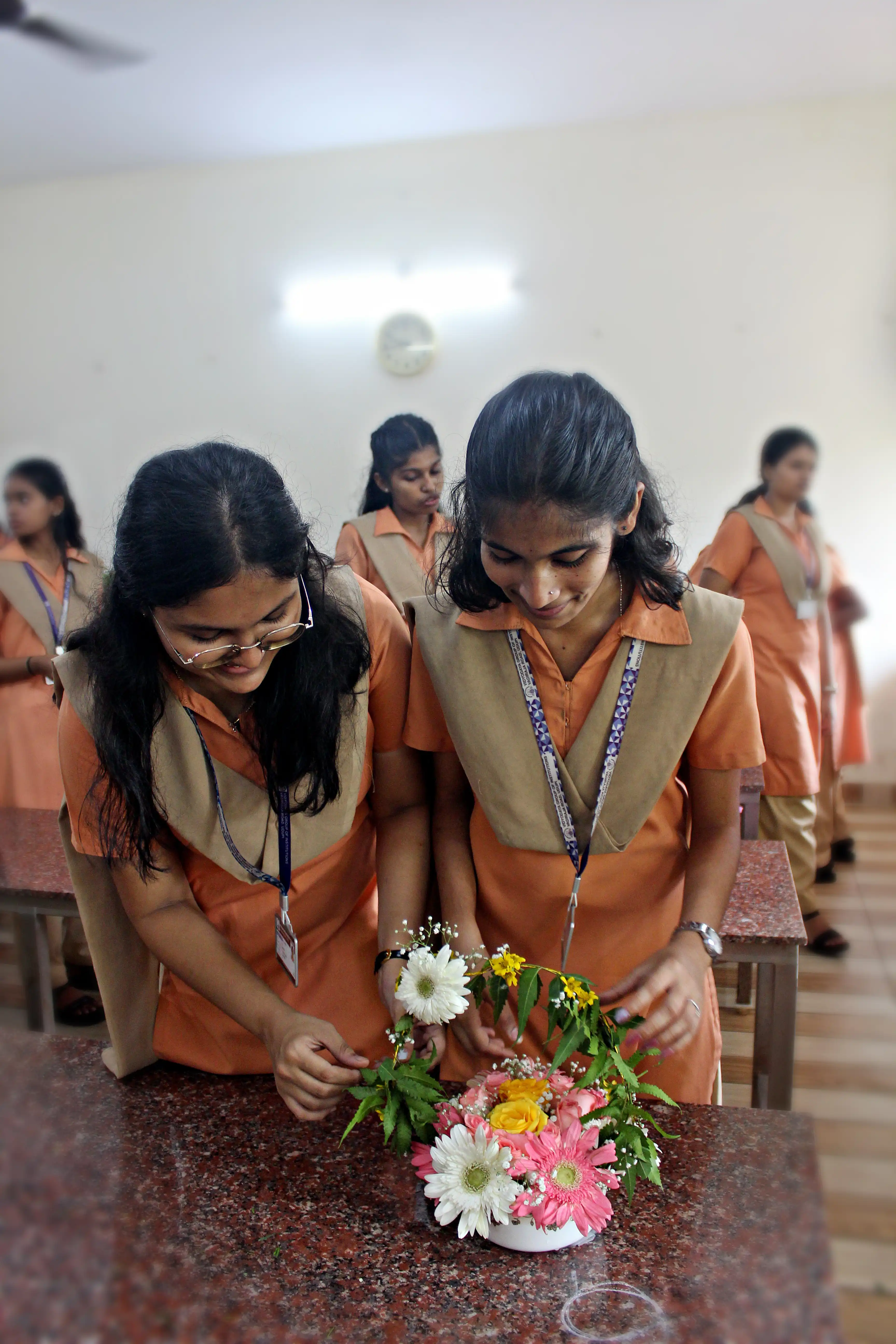 Students arranging flowers during the Flower Arrangement Competition