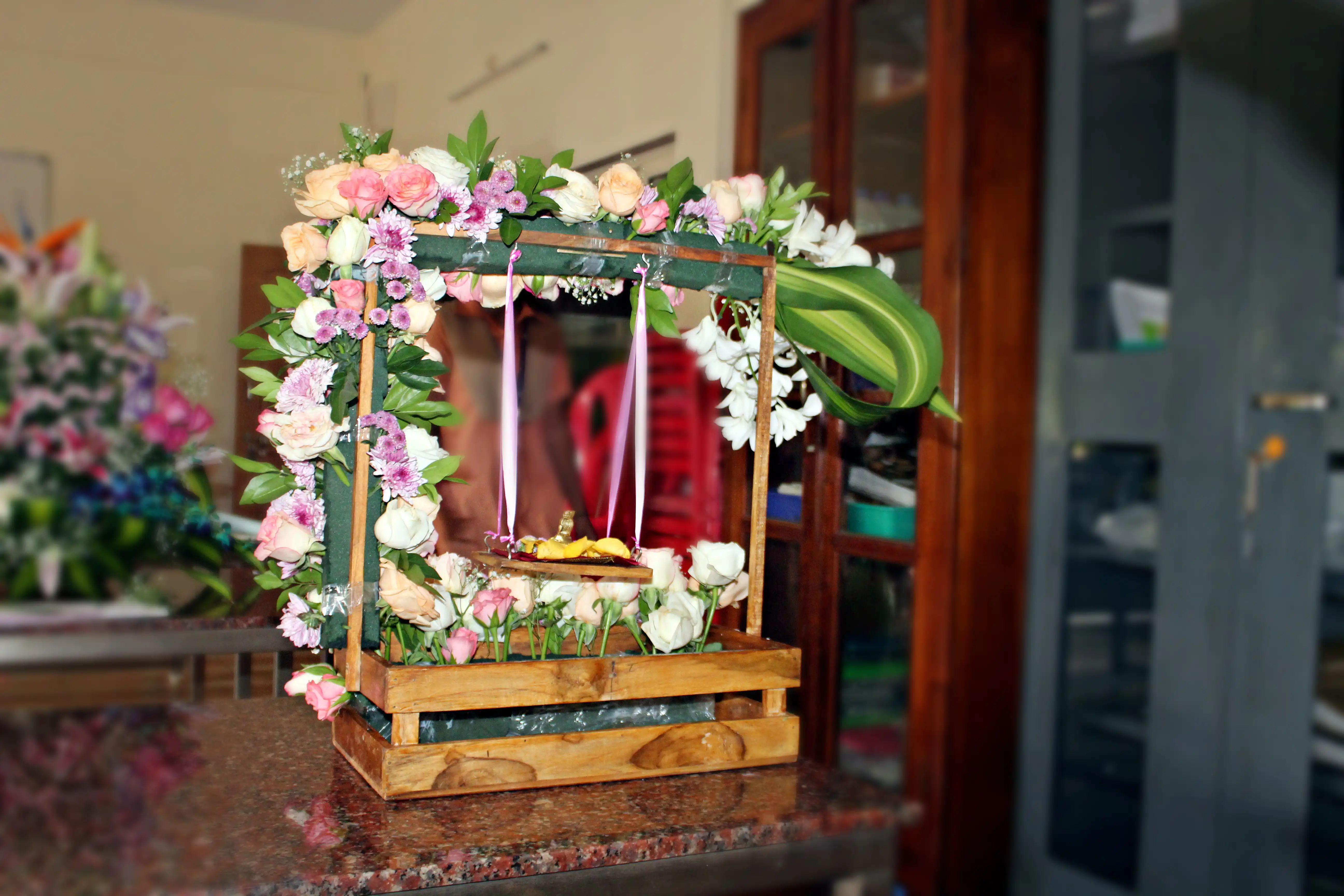 Colourful flowers arranged creatively by students