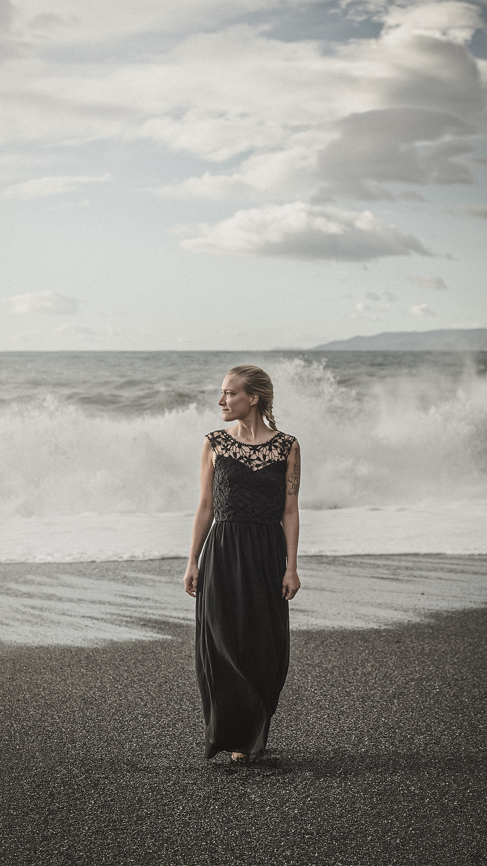 Fashion editorial silhouette on cliff Calabria cinematic portrait