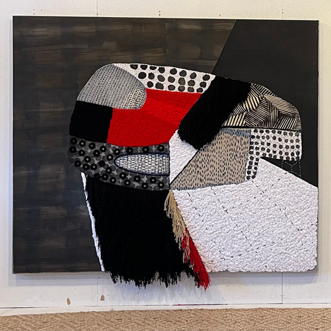 An abstract large-scale collagraph with felt and yarn created by Sarah Amos