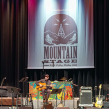 Mountain Stage solo with banner.jpeg