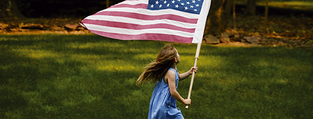 Girl Running with Flag
