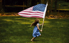 Girl Running with Flag