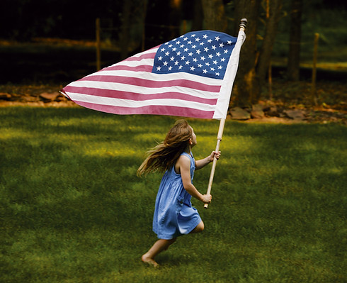 Girl Running with Flag
