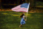 Girl Running with Flag