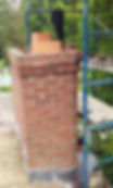 full chimney rebuild with flue liner connected to wood burning fireplace system in Lexington KY by Masons of Kentucky