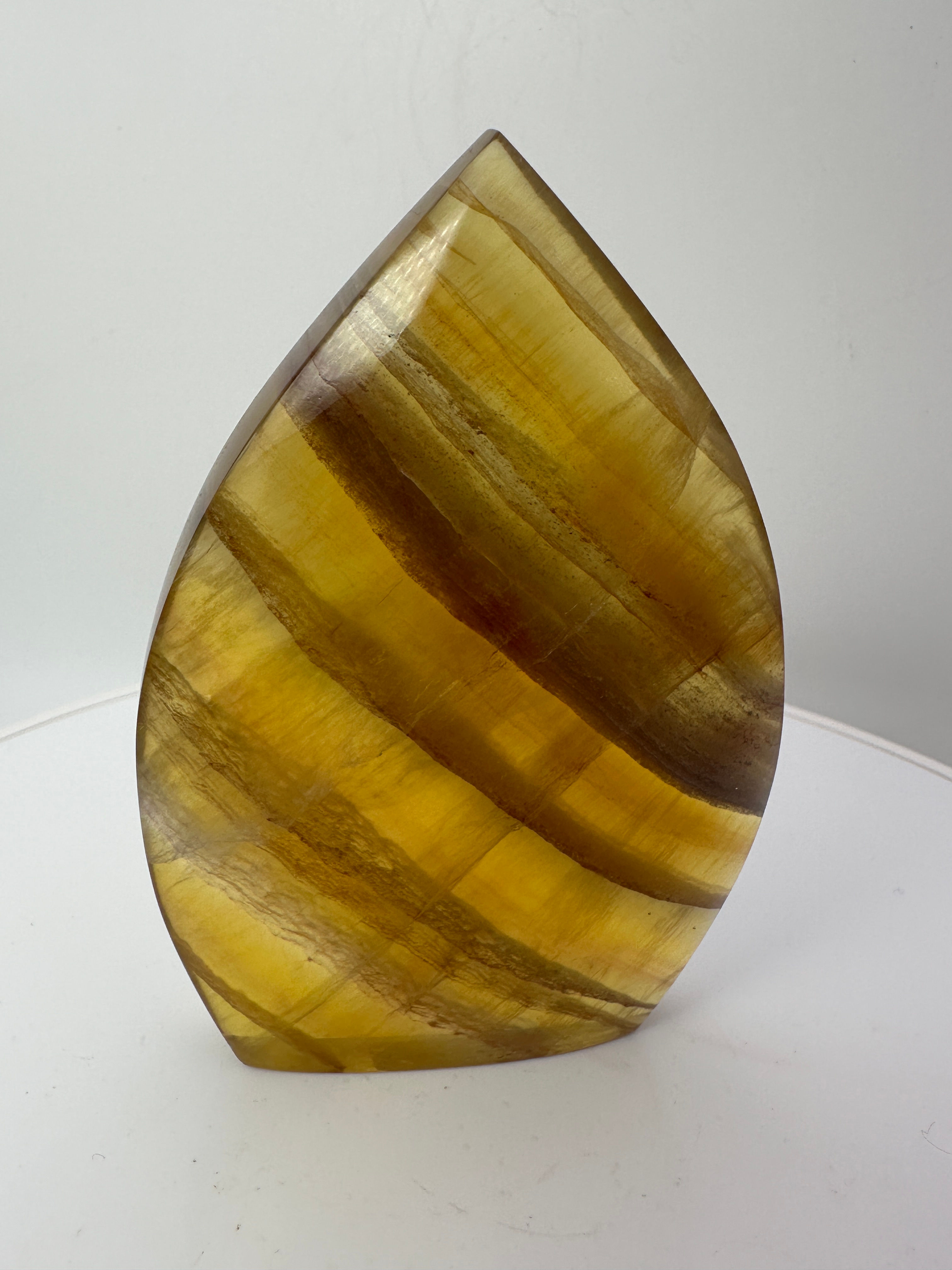 Fluorite Flame - Vibrant, carved crystal known for focus and clarity, perfect for energy work or décor.