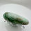 Thumbnail: Green Moonstone Palm - Smooth, polished green gemstone with subtle shimmer.