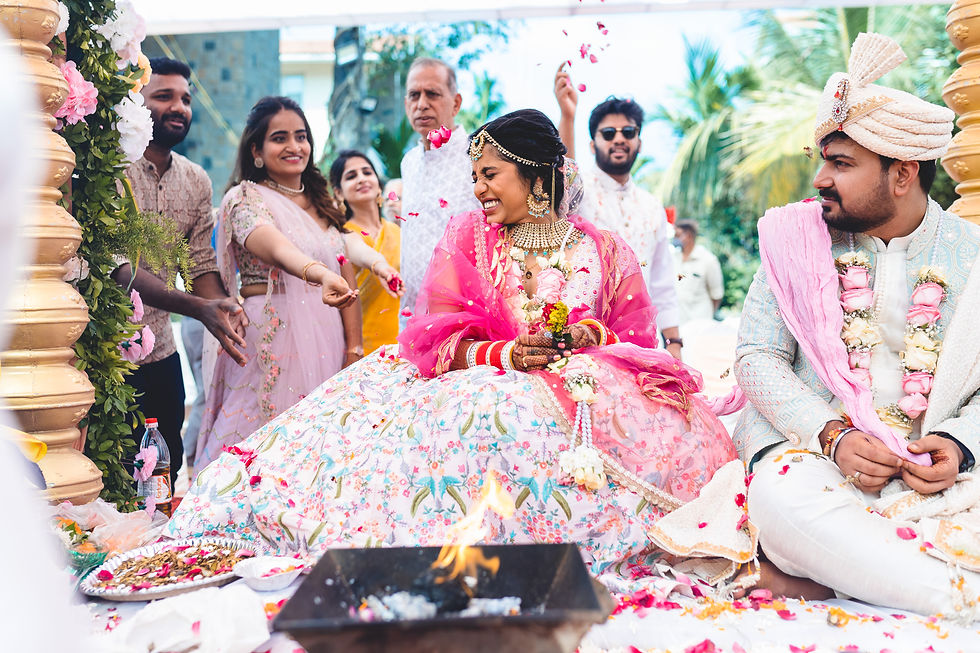 Couple showered with rose petals after the wedding ceremony