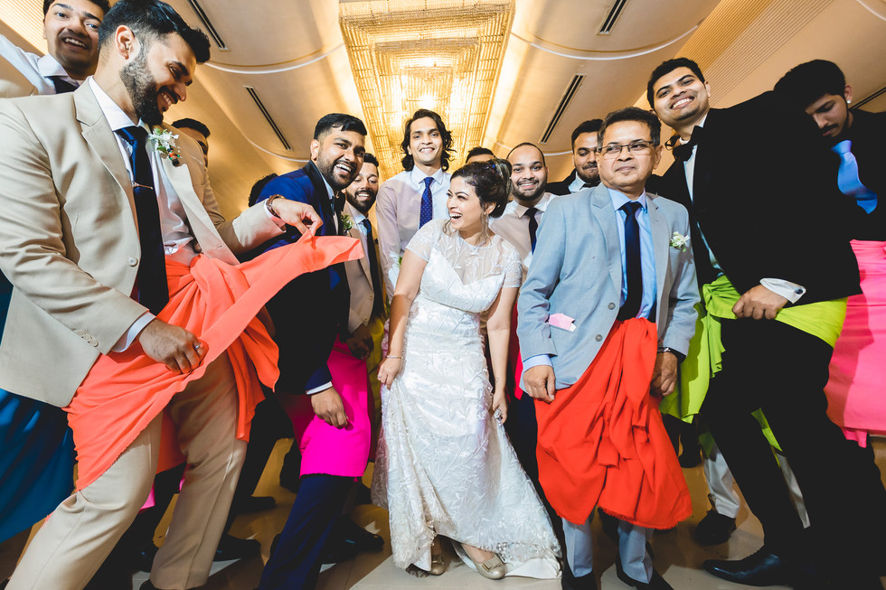 wedding reception group dance with lungi costumes