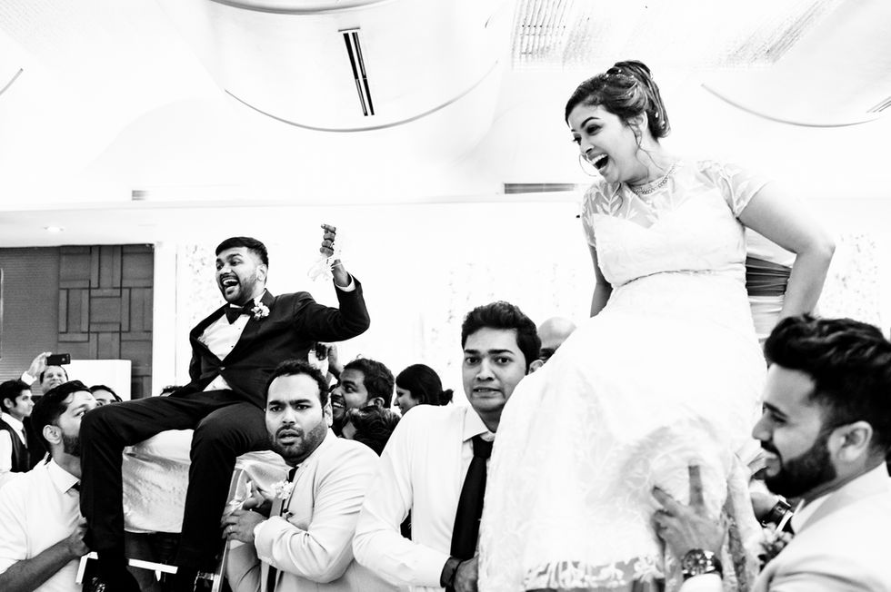 Chair dance performed at catholic wedding reception