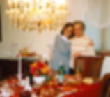 Me, my mother and her beloved chandalier. Here she is doing what she did best, preparing a holiday dinner.
