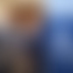 man in tie accepting award for another man