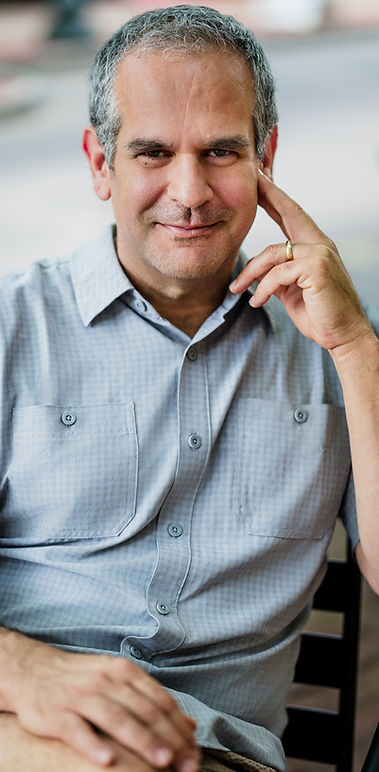 Malcolm De Leo Headshot Sitting Hand Face #3.jpg