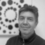 Man in front of an art piece About the artistic concept Superovulation