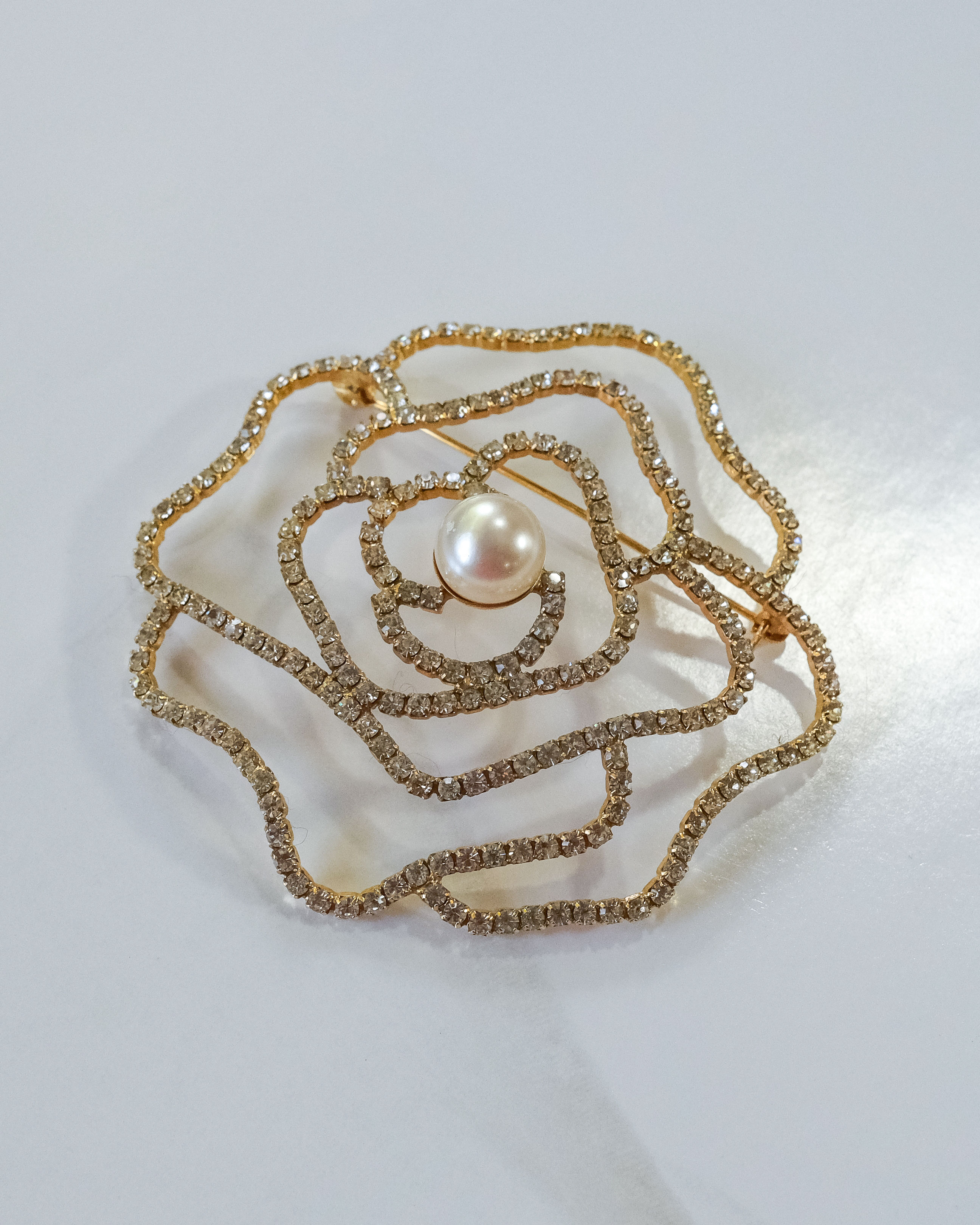 Vintage Gold-Tone Openwork Rhinestone Floral Brooch with Pearl Center