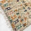 Miniature : Tapis berbère Boujaad beige à motifs colorés 1,60x1,20m
