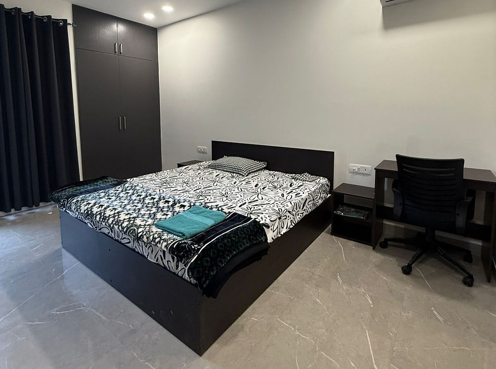 Spacious bedroom with personal wardrobe and a view of the mountains right from your bed.