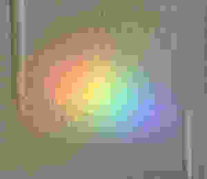 rainbow on a wall at a parking garage