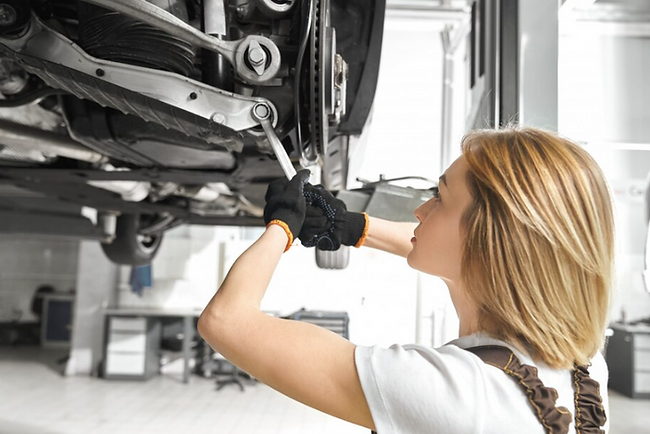 woman-working-on-a-car