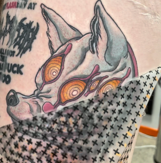 second skin application on japanese style kon tattoo