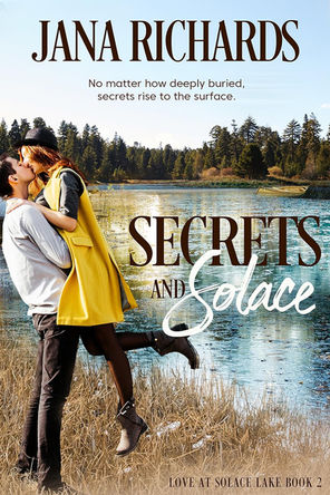 Book cover of Secrets and Solace by Jana Richards, showing a couple kissing by a lake with forest and boat in the background.