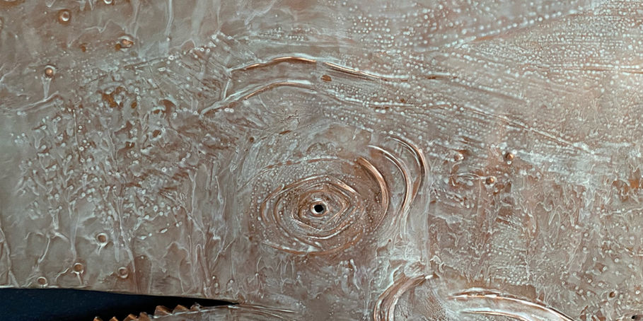 Large Moby Dick whale copper sculpture in a white-ish patina finish.