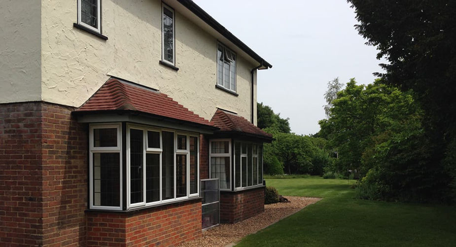 New duplicate bay window, exactly to match the opposite side original.