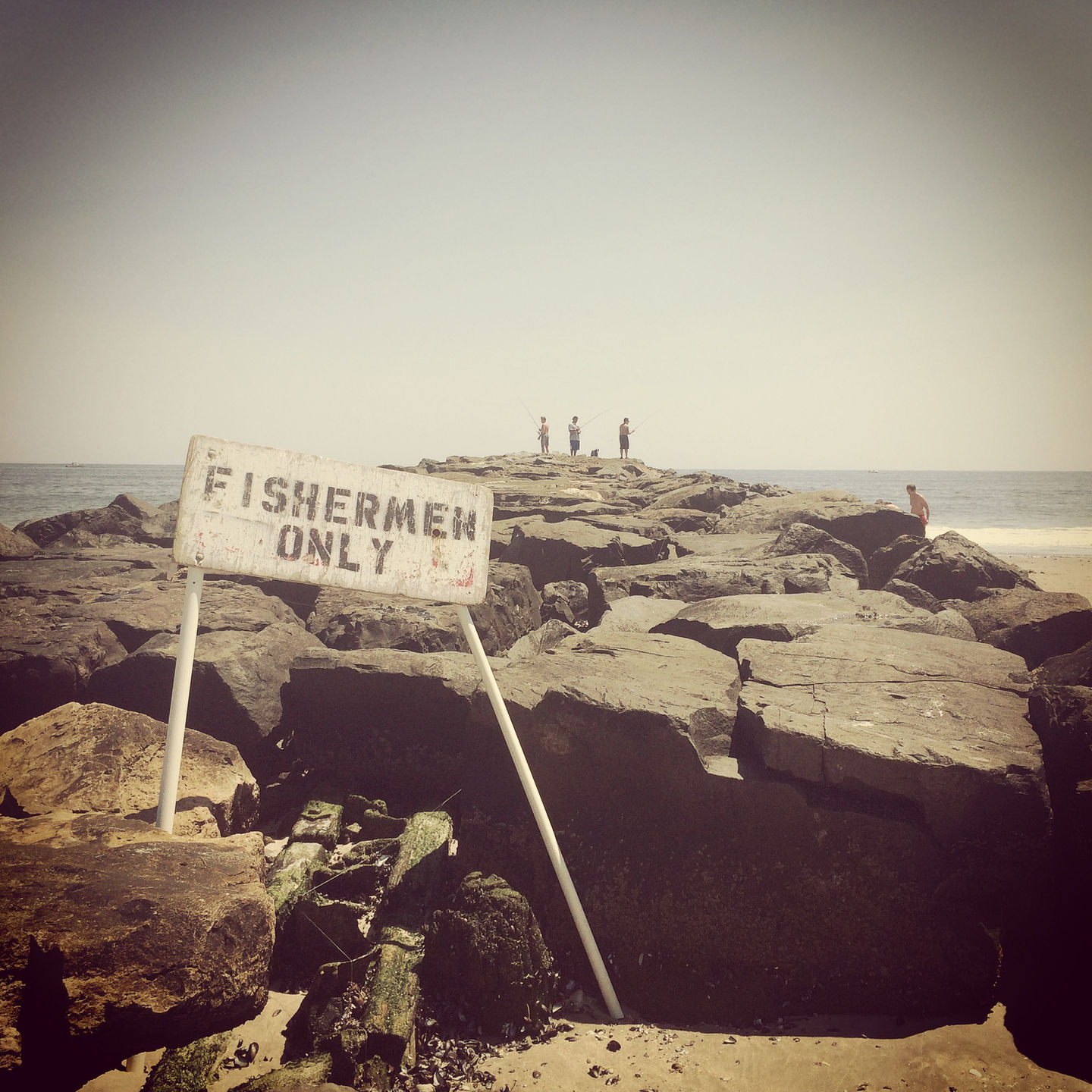 sepia fisherman only sign