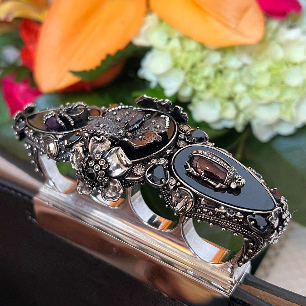 Thumbnail: Alexander McQueen Entomology Knuckle Clutch