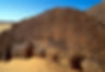 Human figures, resembling the well know shapes African women, engraved unto the Rock surface © David Coulson/TARA