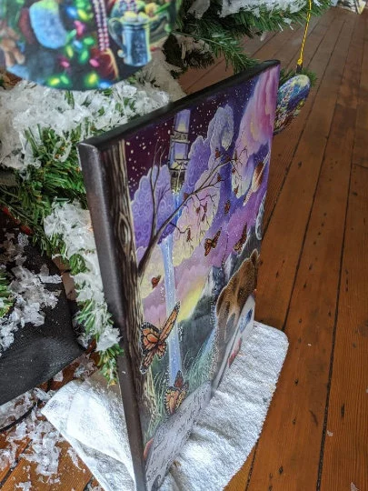 Thumbnail: Adventure through books, bear, butterflies, magical scene, colorful sky, waterfall, mountains, imagination, fantasy art