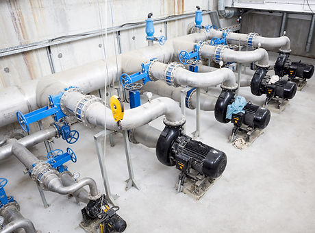 Wastewater treatment plant. A new pumping station. Valves and pipes. Urban modern treatmen