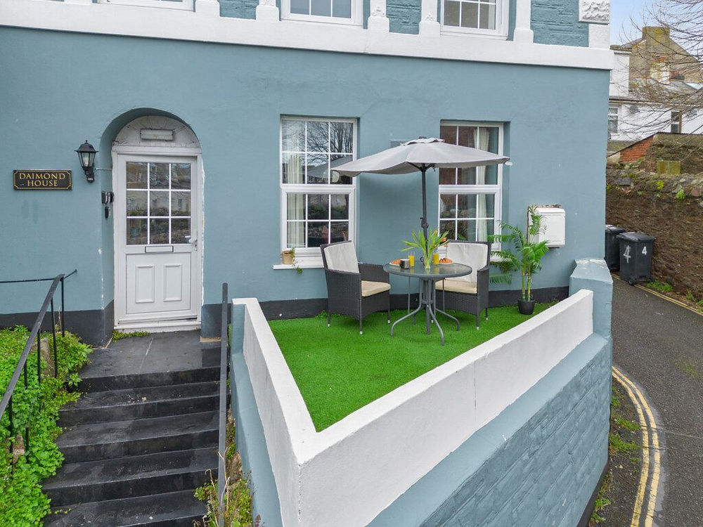 Light blue house with outdoor patio from Mark's Portfolio