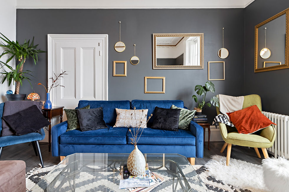 Stylish living room with blue velvet sofa