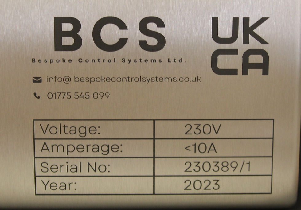 Laser-marked 304 stainless steel enclosure showing CE/UKCA information, electrical ratings and permanent traceability markings.