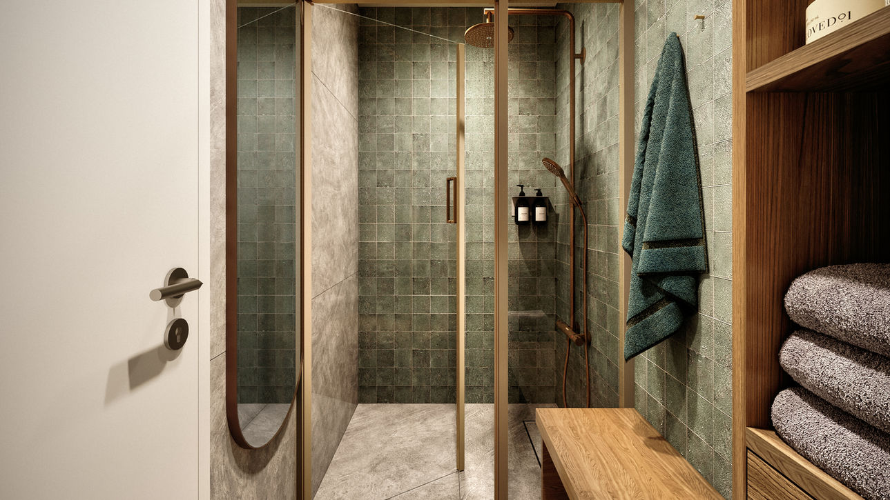 Wellness room in a co-sharing commercial project in Limassol, featuring handcrafted green ceramic tiles, warm timber shelving, brushed brass fixtures, and integrated bench seating—designed by a leading Nicosia interior designer with a focus on restorative interior design.