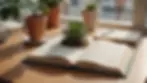 Eye-level view of an open journal on a table adorned with a plant