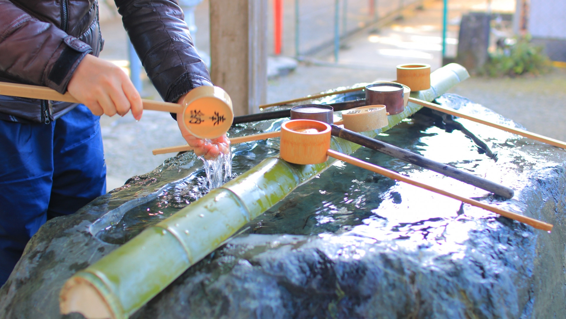 Washing hands at the shrine temizuya