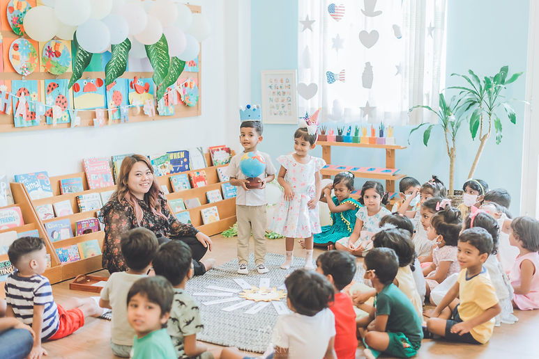 Two students from Jade Drive International Pre-school celebrating their birthdays.