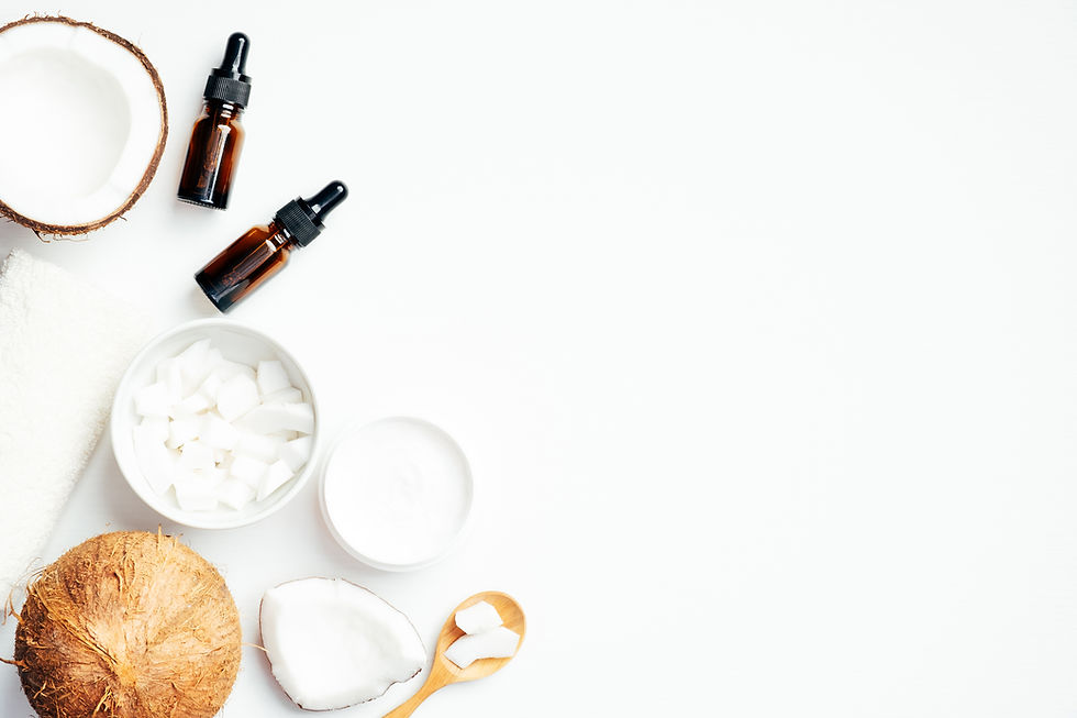 Coconut cream and oil for skin moisturizing on white background. Flat lay, top view, copy