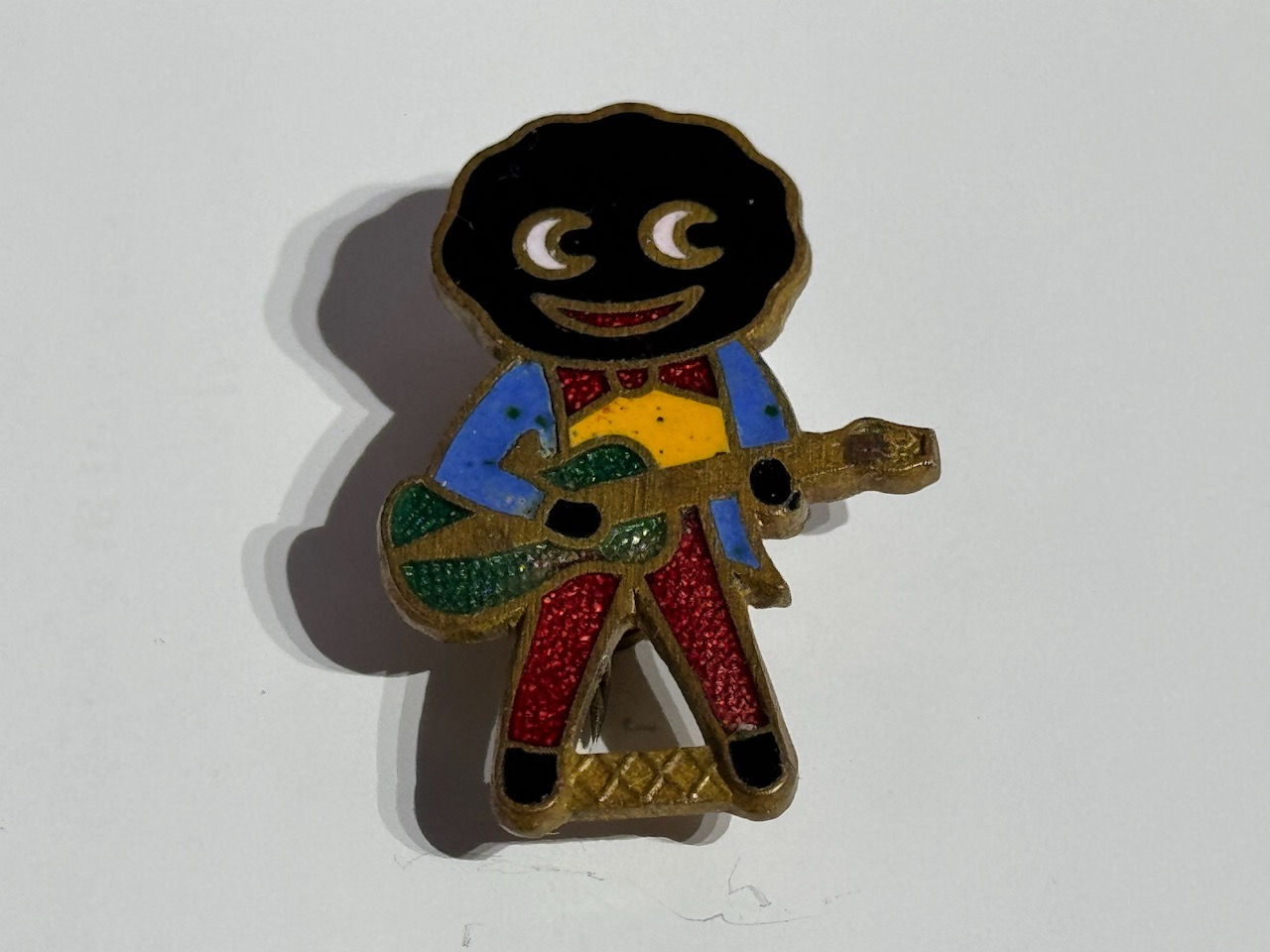 Vintage Robertson's Yellow Shirt Guitarist Enamel Badge